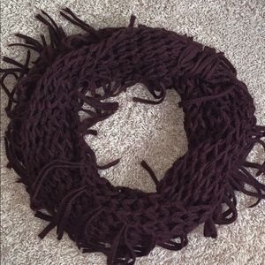 Knitted tassel infinity scarf
